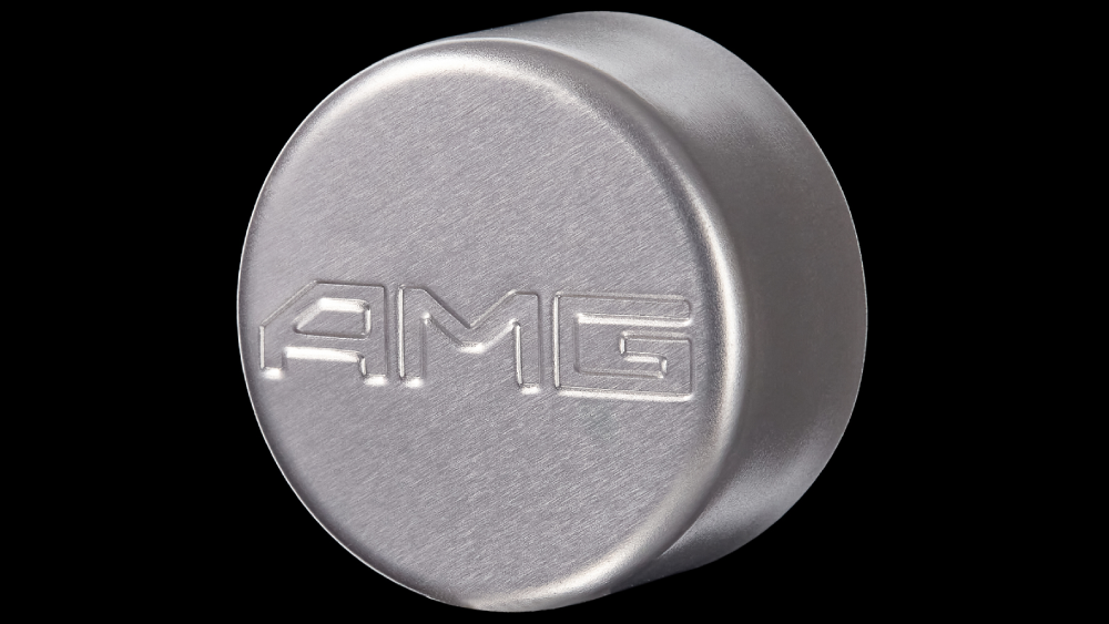 Дебоссинг на алюминиевой крышке логотипа